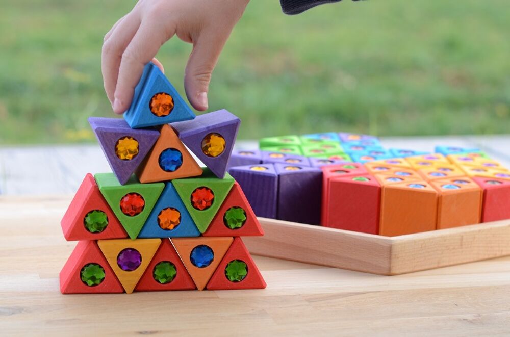 Bauspiel houten driehoekjes met glitterstenen (54 stuks)