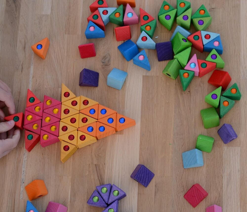 Bauspiel houten driehoekjes met glitterstenen (54 stuks) Bauspiel houten driehoekjes met glitterstenen (54 stuks)