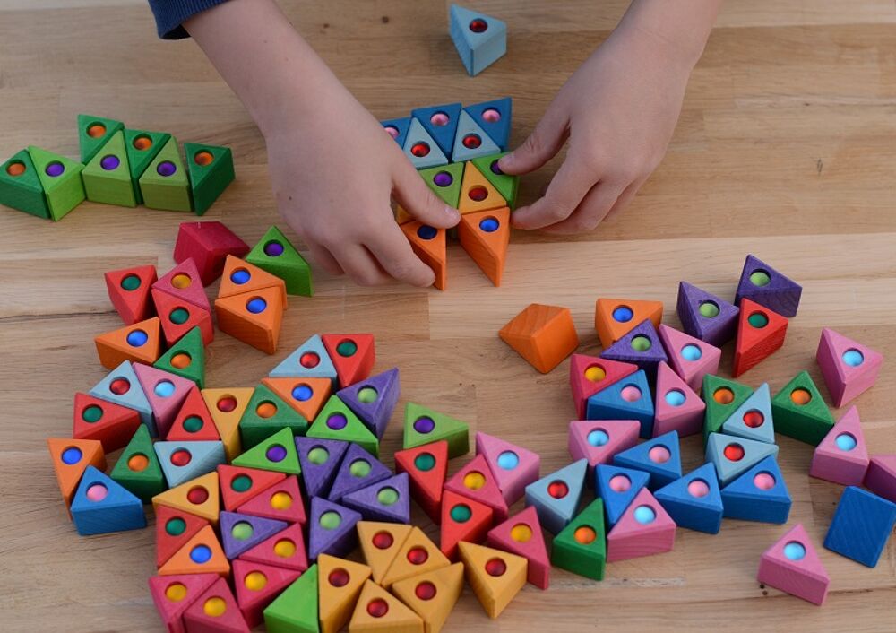 Bauspiel houten driehoekjes met glitterstenen (54 stuks)